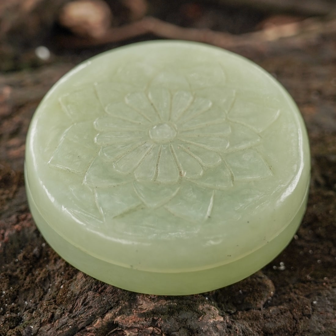Antique Chinese Carved Jade Paste Box: Antique Chinese Carved Jade Paste BoxEarly 20th century, ChineseAn antique Chinese jade scholar's paste box with carved floral medallion motif on lid.H .625" x Diameter 2.125"