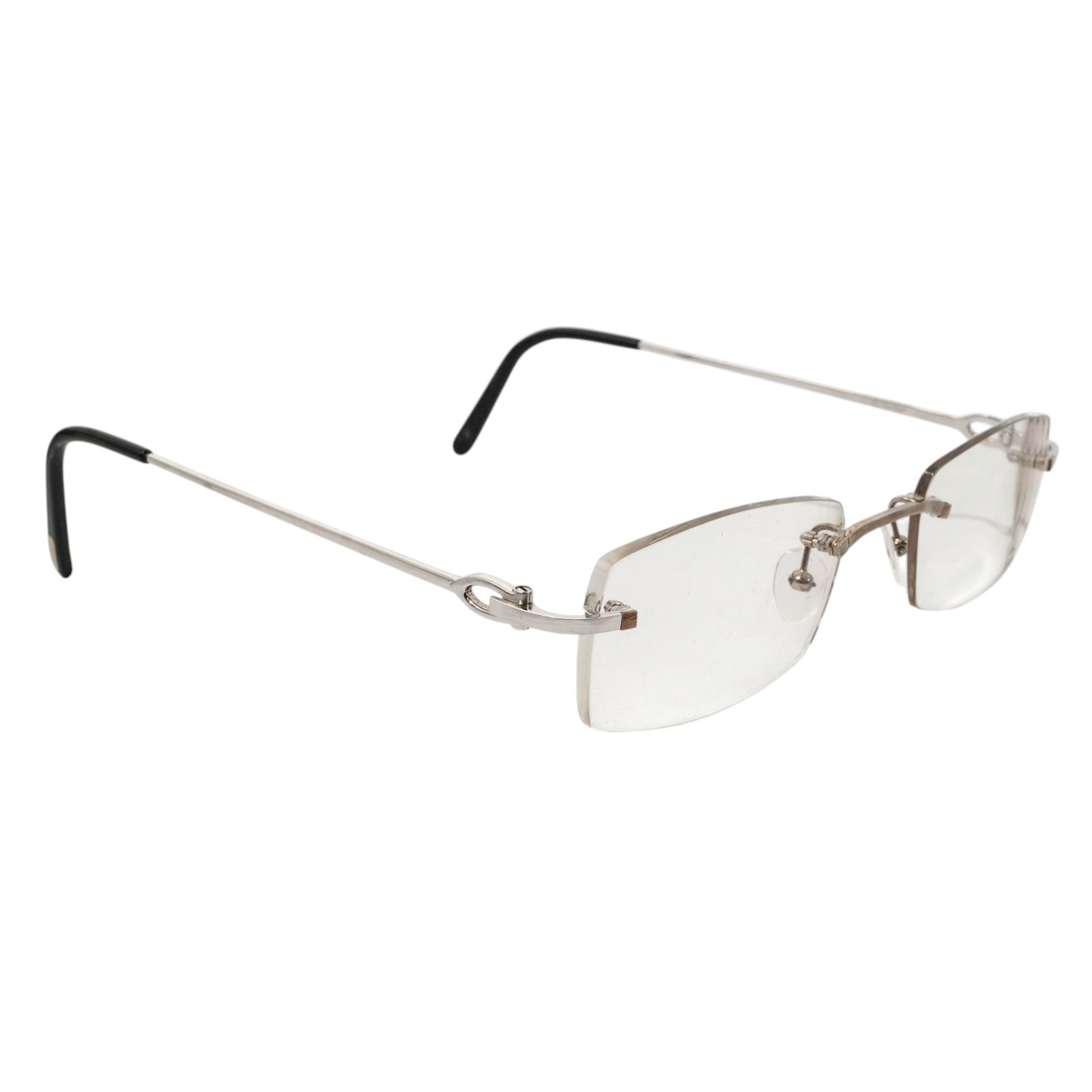 Vintage Cartier Rimless Glasses and Case: Vintage Cartier Rimless Glasses and Case 20th century, French Vintage Cartier rimless eyeglasses in a silver tone metal. Marked on temples "140 made in France Cartier Paris". Marked on bridge