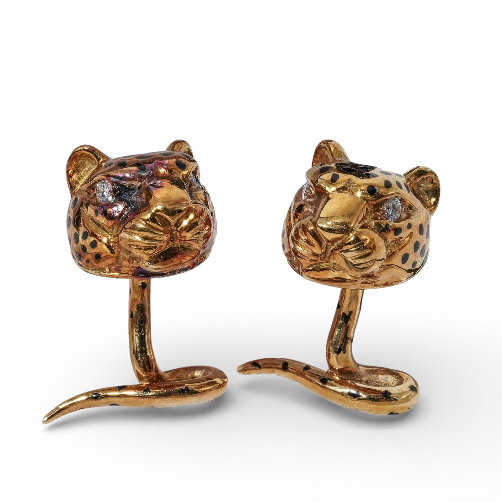 Emis 18k Gold & Diamond Leopard Head Cufflinks: Emis 18k Gold & Diamond Leopard Head Cufflinks 1980s-1990s, USA Pair of Emis 18K yellow gold leopard head cufflinks, modeled with sculptural, textured feline heads accented by black enamel spotting.