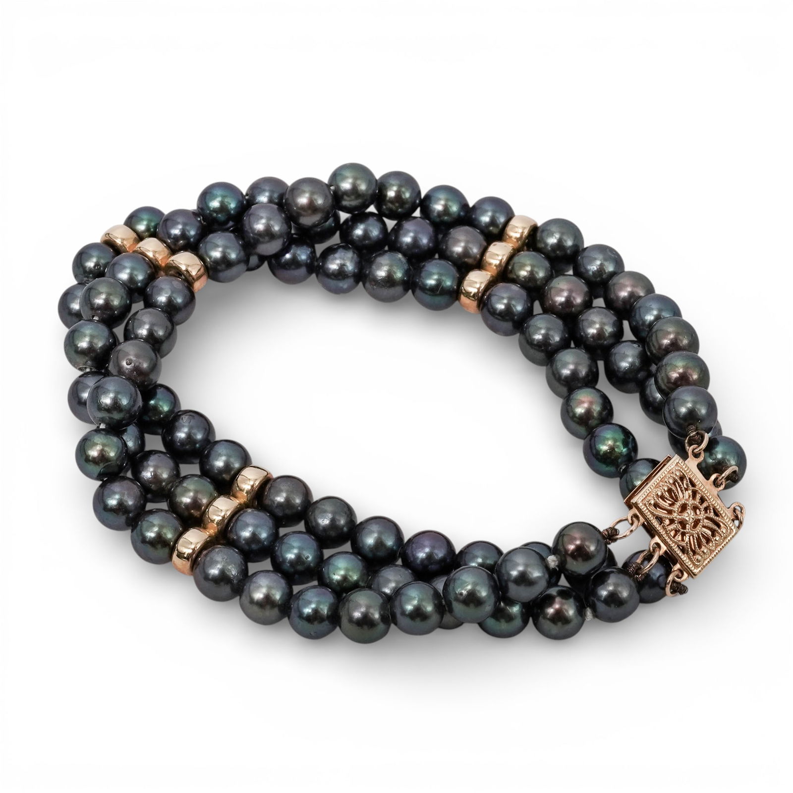 14k Gold & Tahitian Pearl Bracelet Signed: 14k Gold & Tahitian Pearl Bracelet Signed1990s-2000s, USAThree-row bracelet composed of lustrous dark Tahitian pearls, uniform and displaying natural gray to charcoal overtones. The strands are secure