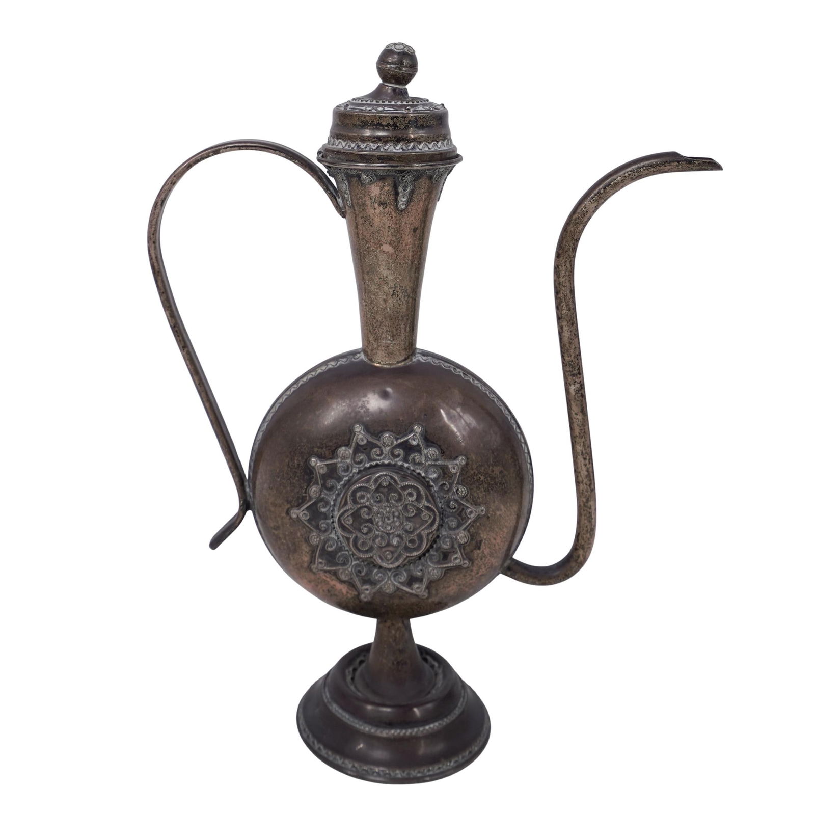 Middle Eastern Sterling Silver Filigree Ewer: Middle Eastern Sterling Silver Filigree Ewer20th c., IsraelSterling silver ceremonial pitcher with a flared base, round body, slender neck, hinged lid, and slender curved handle and spout. It is decor