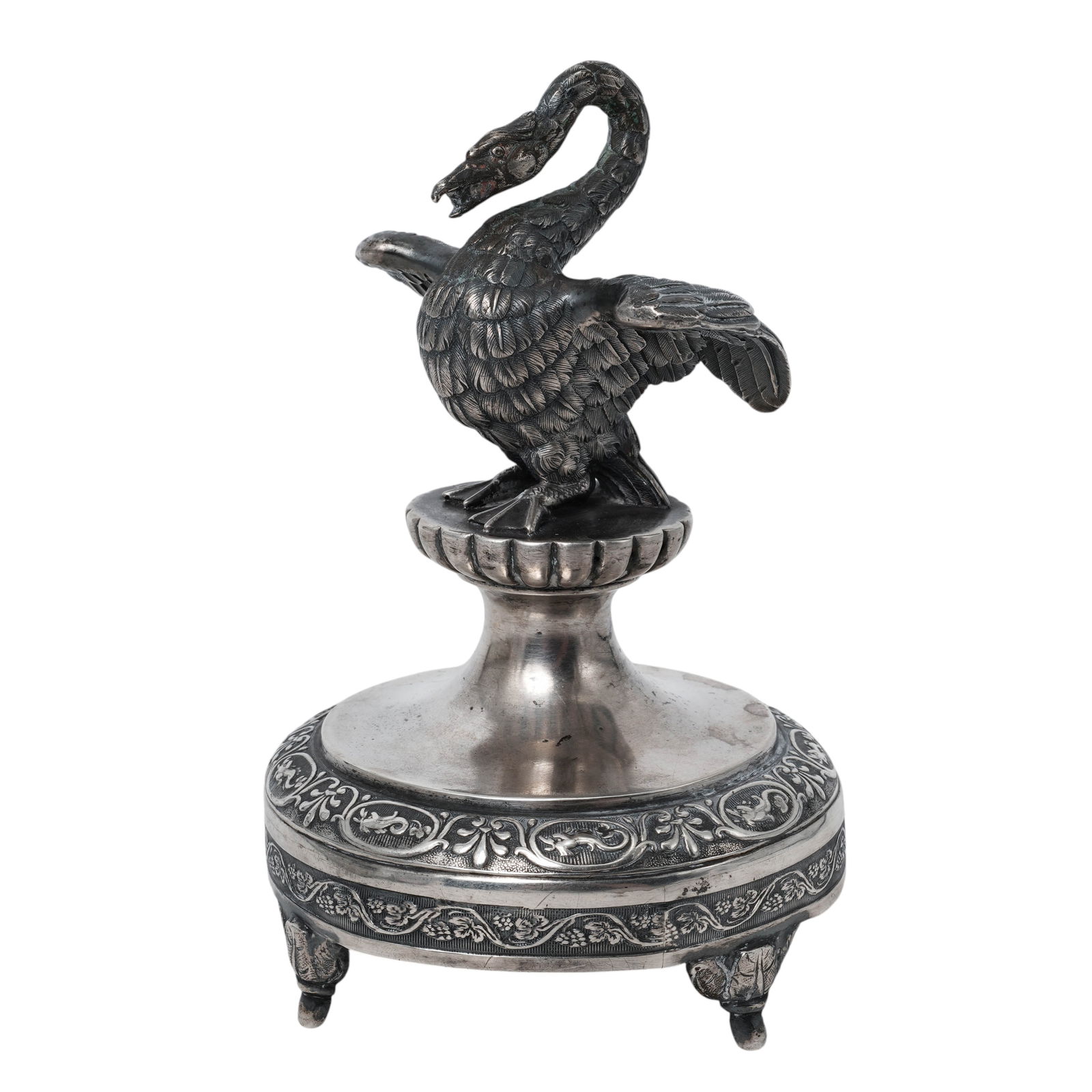 Antique Sterling Silver Swan Figurine: Antique Sterling Silver Swan Figurine Late 19th century An antique silver swan figurine with a filigree designed footed base. Total weight: 205.9 grams. H 5" x Base diameter 3"