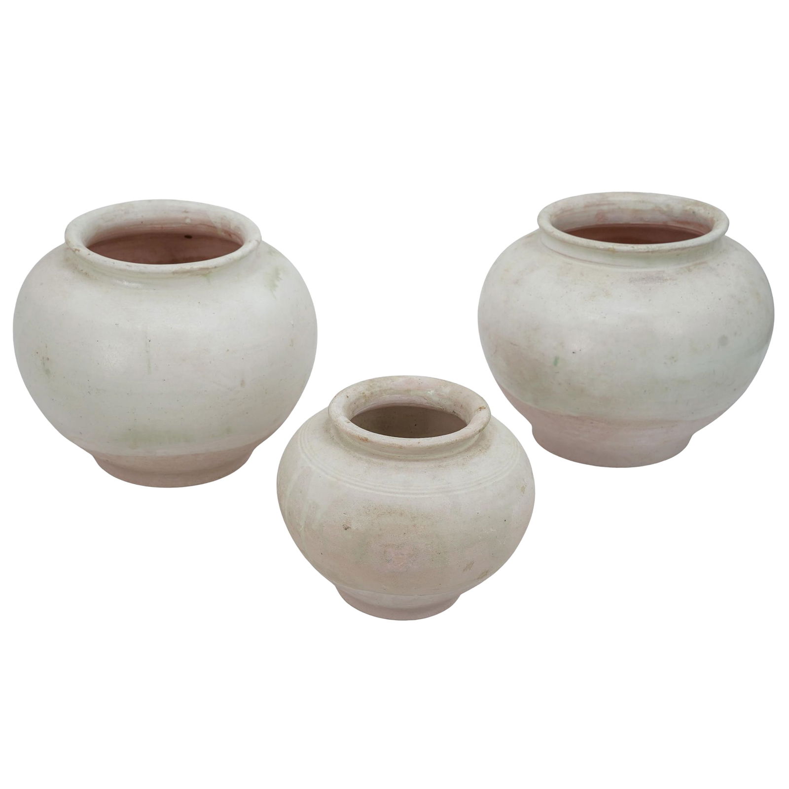 (3 Pc) Chinese Tang Dynasty White-Glazed Pottery Jars: (3 Pc) Chinese Tang Dynasty White-Glazed Pottery Jars 618–907 CE, China Antique Chinese earthenware jars featuring globular bodies covered in a green-tinged white lead glaze that stops short of the