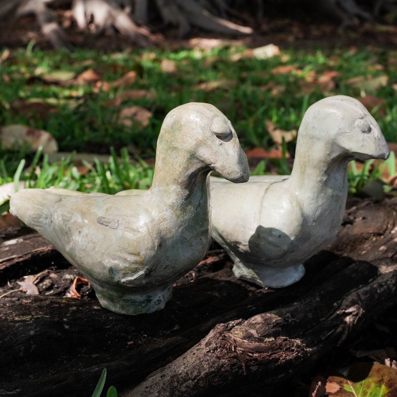 Pair Chinese Han Dynasty Green Glazed Pottery Bird Figurines: Pair Chinese Han Dynasty Green Glazed Pottery Bird Figurines 206 BCE-220 CE, China Two antique Chinese green glazed ceramic bird figurines. They have a distinctive lead-based green glaze with a