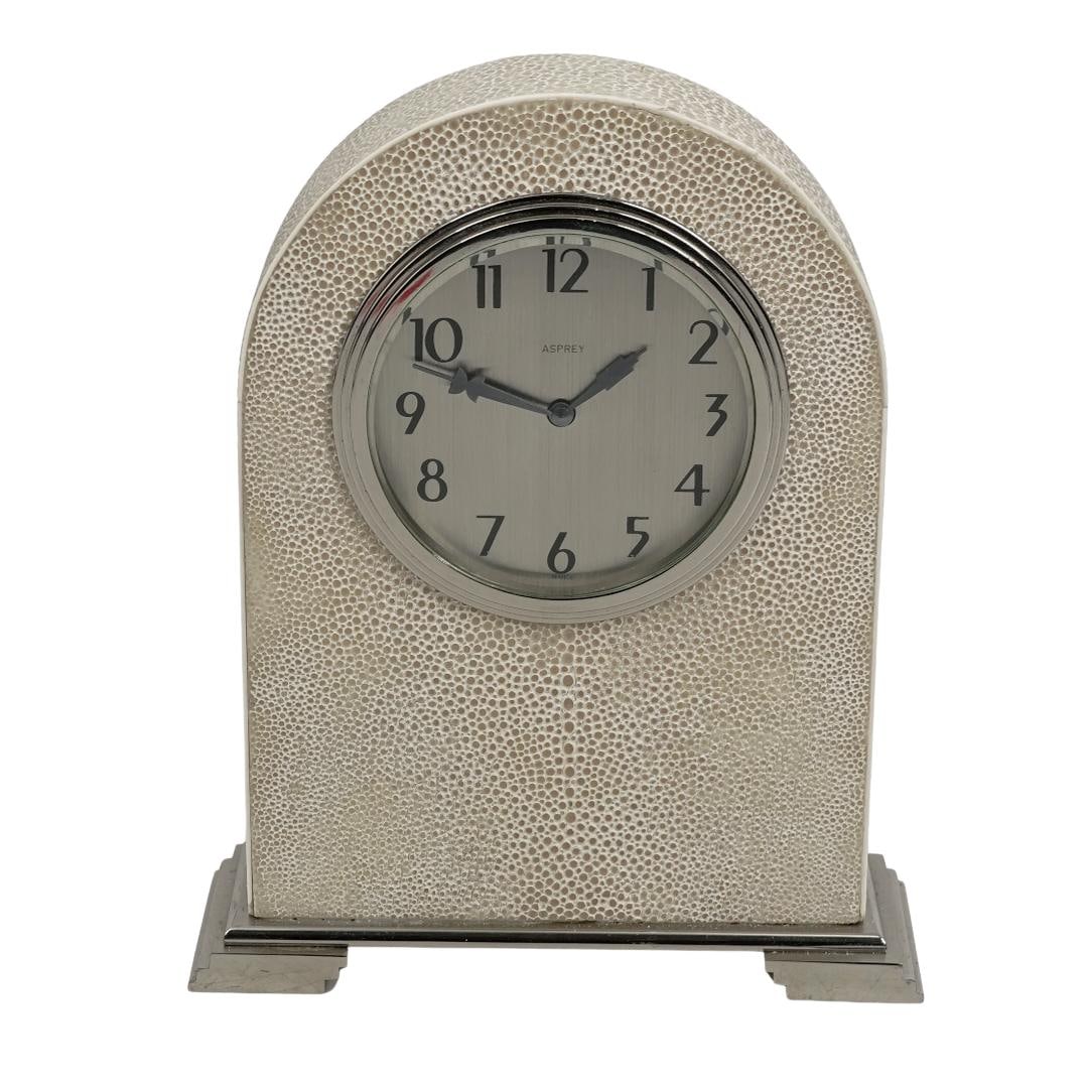 Art Deco Asprey Shagreen Table Cock: Art Deco Asprey Shagreen Table Cock 1920s-1930s, England The clock features an 8-day French movement. The case is covered in shagreen, the bezel and base are chrome. Marked Asprey, France . H. 8" x