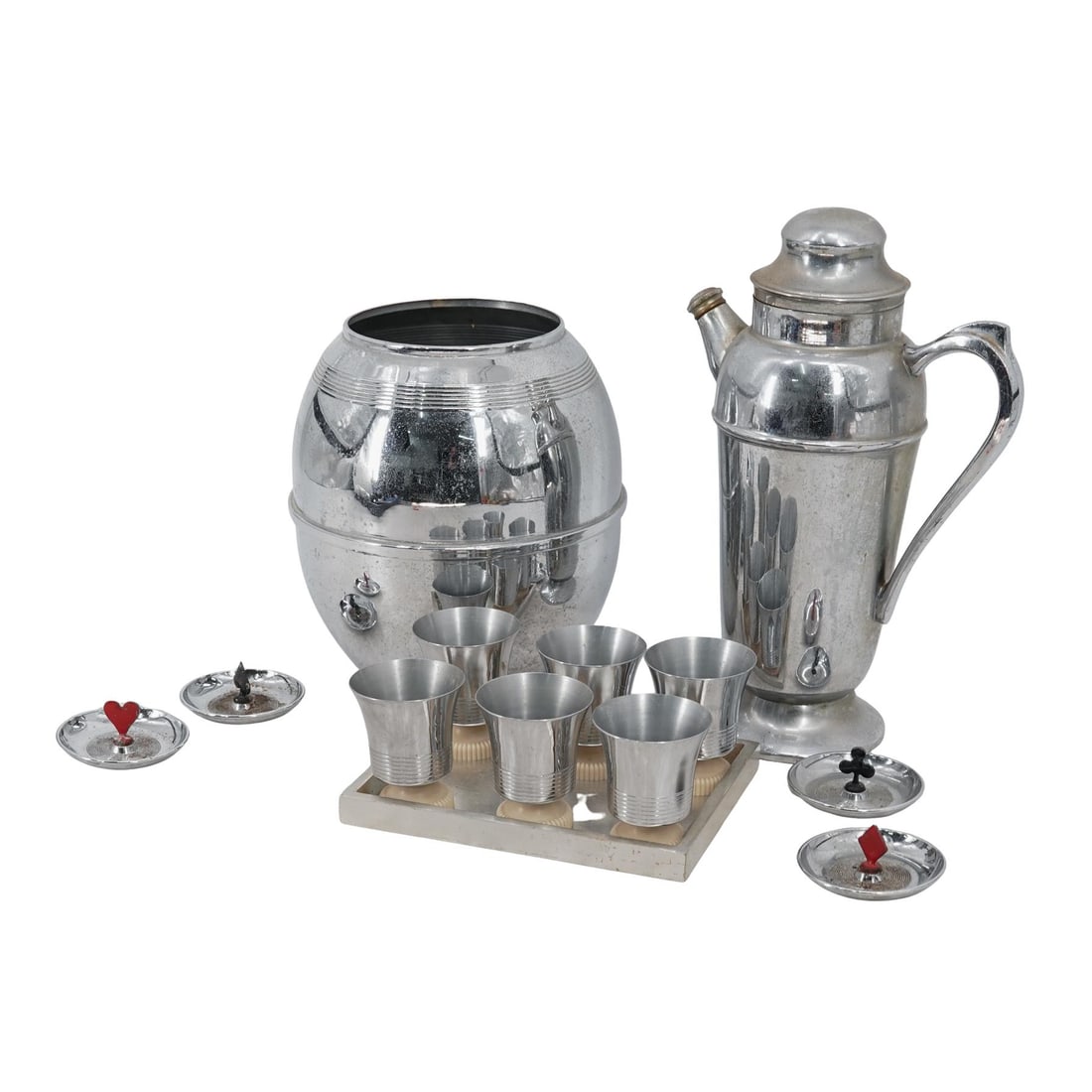 (9 pcs) Art Deco Streamline Modern Barware Set: (9 pcs) Art Deco Streamline Modern Barware SetEarly 20th century, USA(6) Chase Metalworks cups. Marked on bottom "Chase USA" with hallmark.(4) Cup rests. Marked on bottom "made in USA" with hallmark.(