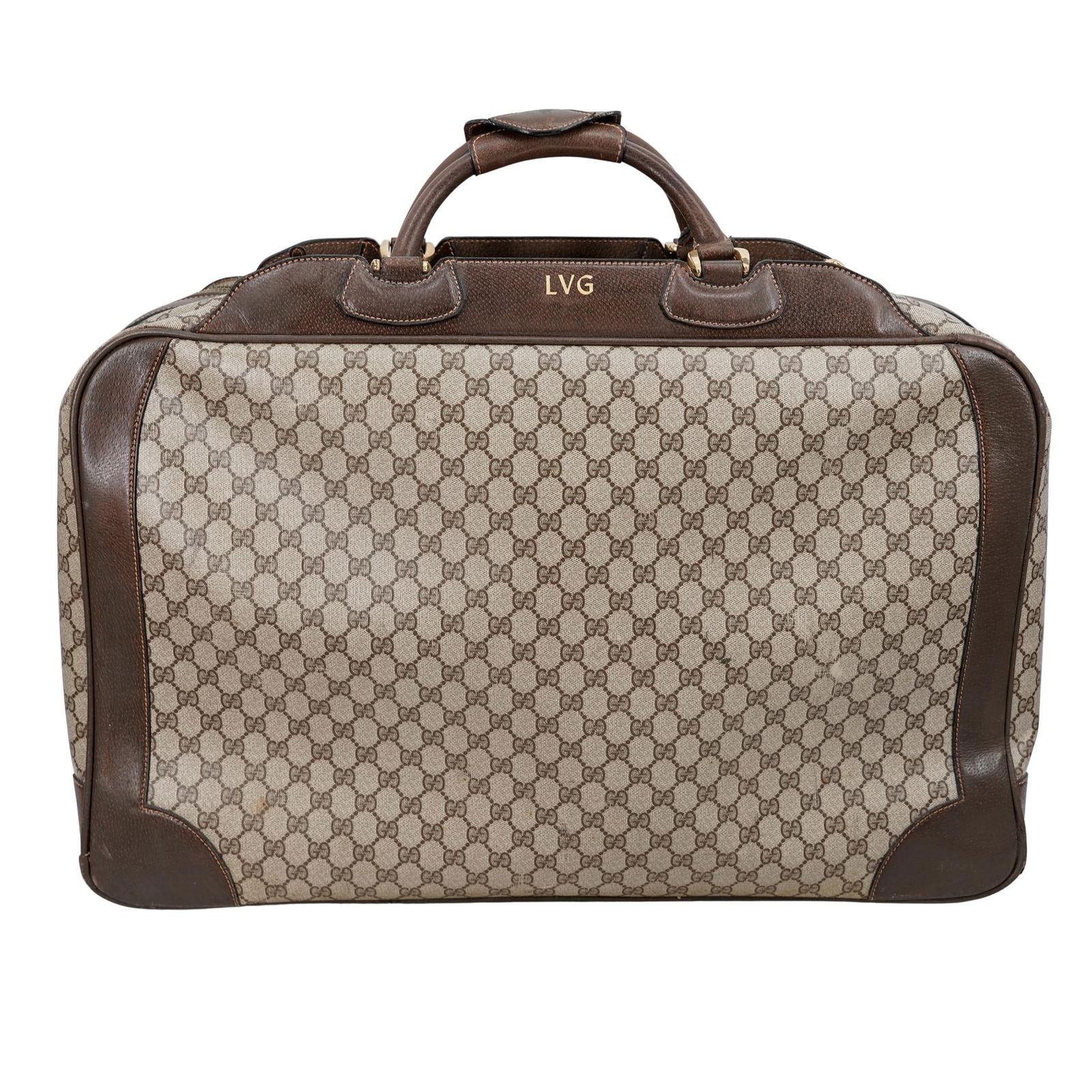 Vintage Gucci GG Monogram Suitcase: Vintage Gucci GG Monogram Suitcase 1970s-80s, Italian Vintage Gucci Suitcase featuring the iconic GG monogram print on coated canvas.`This classic piece is crafted from monogram canvas with rich