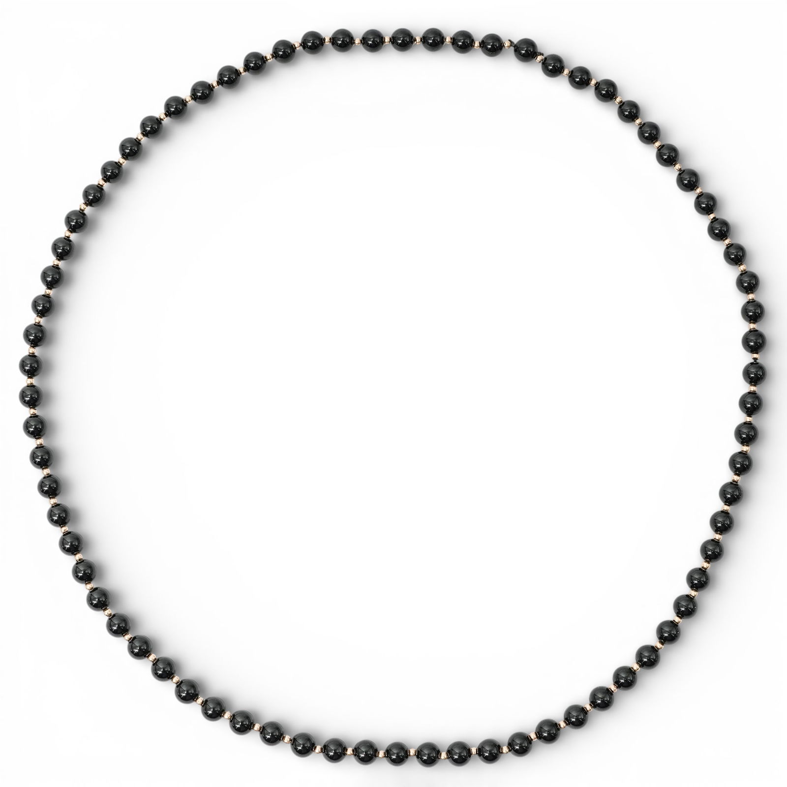 14k Gold & Onyx Bead Necklace: 14k Gold & Onyx Bead Necklace 1980s-1990s Strand necklace composed of polished spherical black onyx beads, each separated by textured 14k gold spacer beads. Uniform bead sizing throughout, strung in