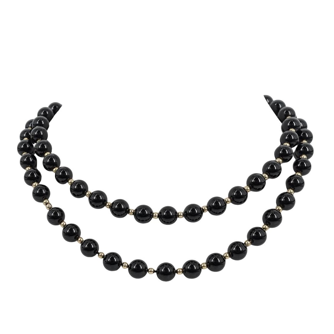 14K Gold And Onyx Bead Necklace: 14K Gold And Onyx Bead Necklace Late 20th c., USA Necklace featuring round polished black onyx beads and 14 karat yellow gold spacers. Total weight: 53.2g (34dwt) L: 30"