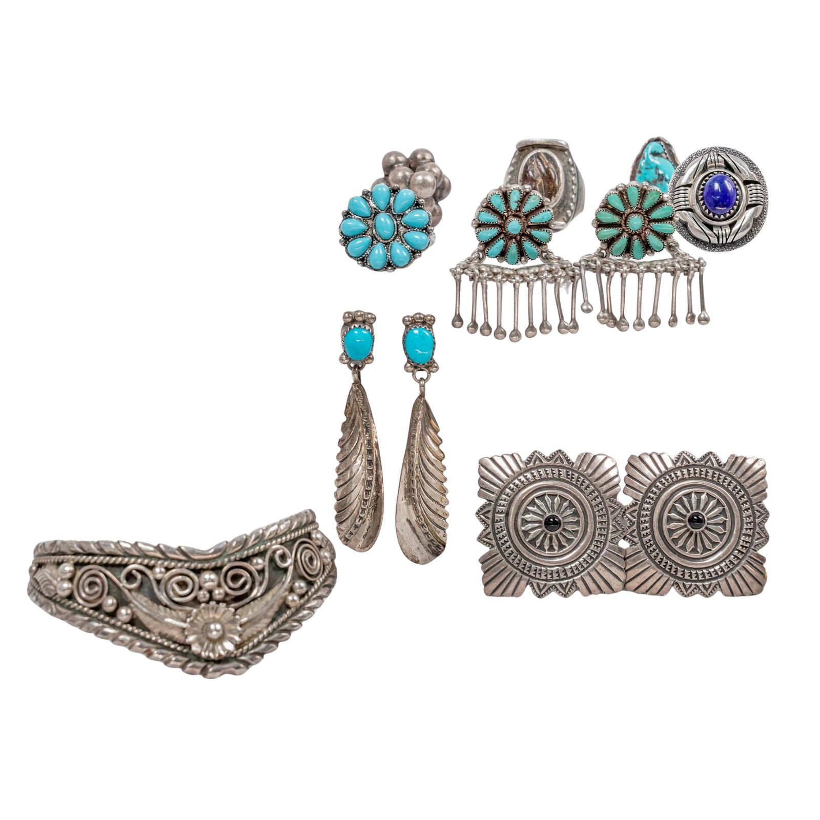 (10 pcs) Navajo Sterling Silver Jewelry: (10 pcs) Navajo Sterling Silver Jewelry 20th century, American Navajo/Native American sterling silver jewelry selection. Ring sizes approx. 6.5. Cuff bracelet size 6. (5) Sterling silver jewelry with