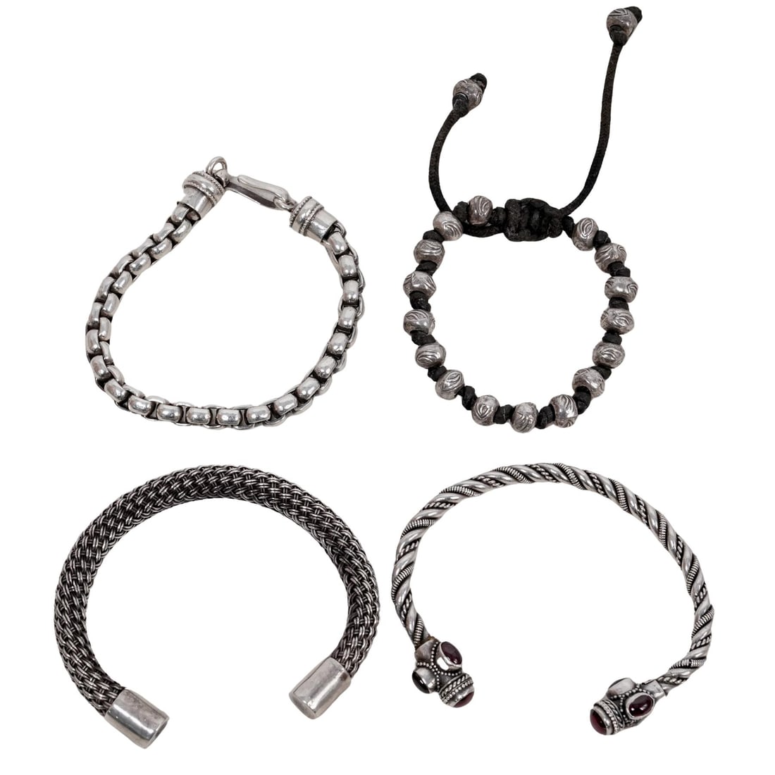 (4 pcs) Sterling Silver Bracelets and Cuffs: (4 pcs) Sterling Silver Bracelets and Cuffs Mid to late 20th century A set of four sterling silver or silver bracelets and cuffs. Sizes 6"-7". (1) Unmarked silver beaded bracelet with black rope