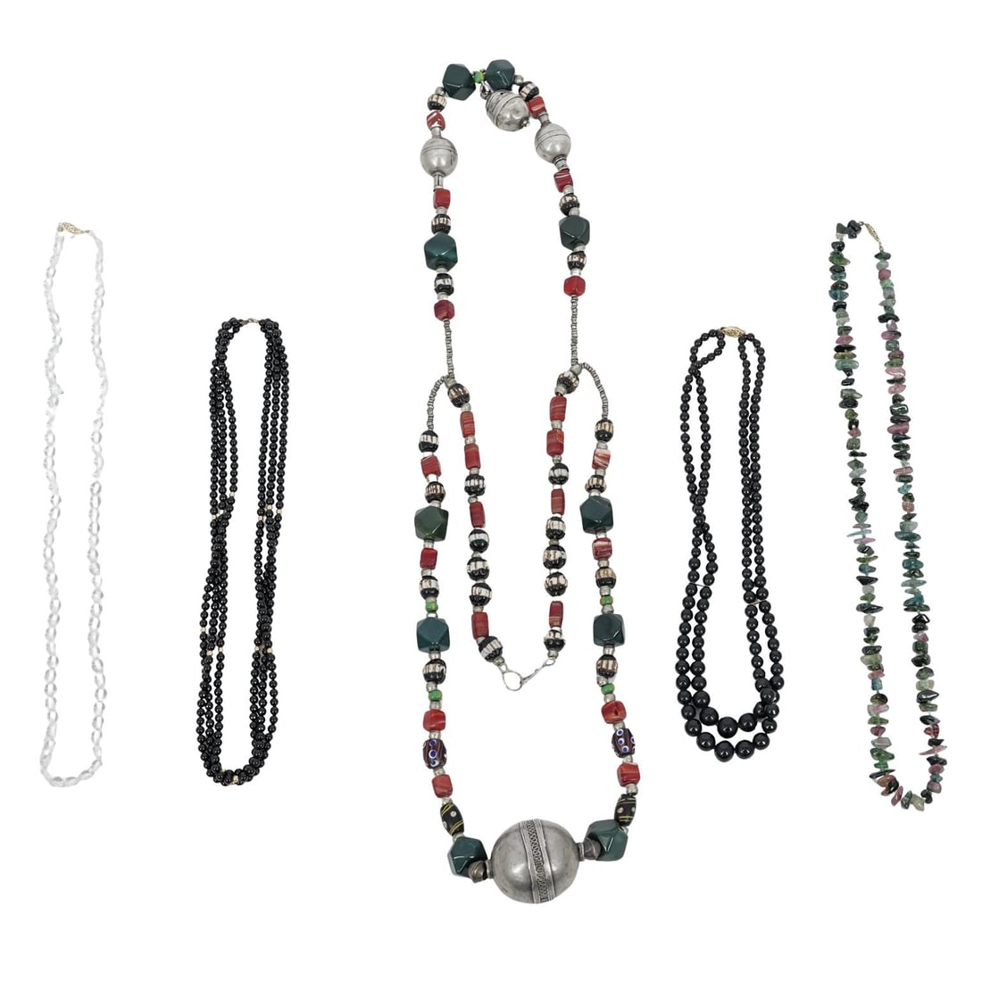 (6 pcs) Silver, Stone, Glass, and Wood Beaded Necklaces: (6 pcs) Silver, Stone, Glass, and Wood Beaded Necklaces 20th century (6 pc) beaded necklaces (1) Clear glass beaded necklace with a 14k gold clasp. Marked on clasp "14k". Total weight: 22 grams/ 14