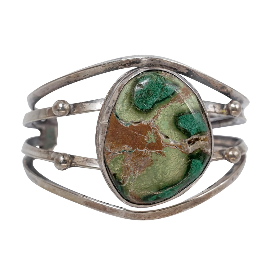 Handcrafted Silver and Royston Turquoise Cuff: Handcrafted Silver and Royston Turquoise Cuff20th century, AmericanA handcrafted silver and Royston turquoise cuff bracelet. Size 6"-6.5". Total weight: 38.6 grams.Diameter 2.25" x Stone L 1.125"