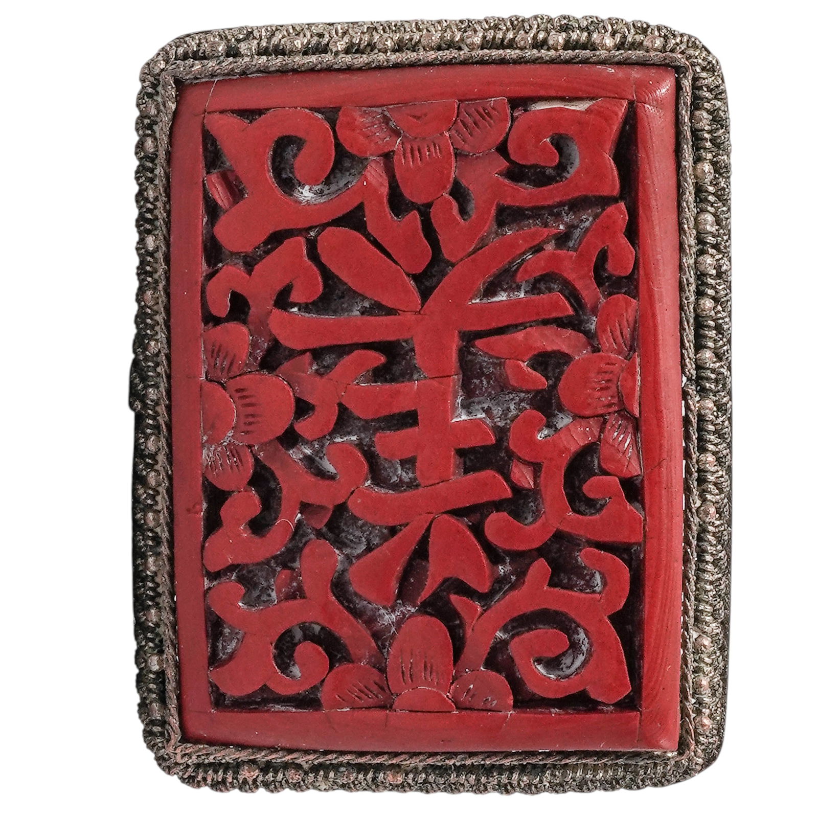 Antique Chinese Silver Filigree and Cinnabar Tie Pin: Antique Chinese Silver Filigree and Cinnabar Tie Pin Late 19th-early 20th century. Chinese An antique Chinese carved cinnabar tie pin set in a silver filigree frame. Includes a carved "mei" or