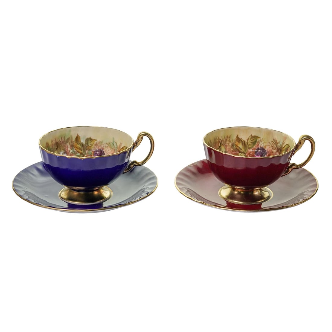 (4pc) Aynsley "Orchadrd Fruit" Porcelain Cup & Saucer Set: (4pc) Aynsley "Orchadrd Fruit" Porcelain Cup & Saucer SetEarly to mid 20th Cent.,EnglishA Vintage Aynsley "Orchard Gold" porcelain set including:Two teacups in contrasting color, one finished in deep