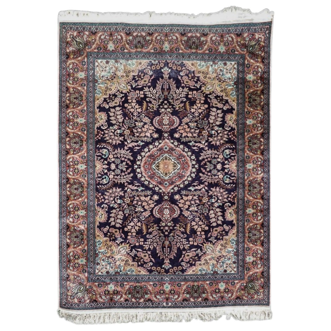 Oriental Wool Floral Runner Rug: Oriental Wool Floral Runner Rug 20th Century A Persian style runner rug featuring floral designs throughout. L: 78" W: 48" including tassels