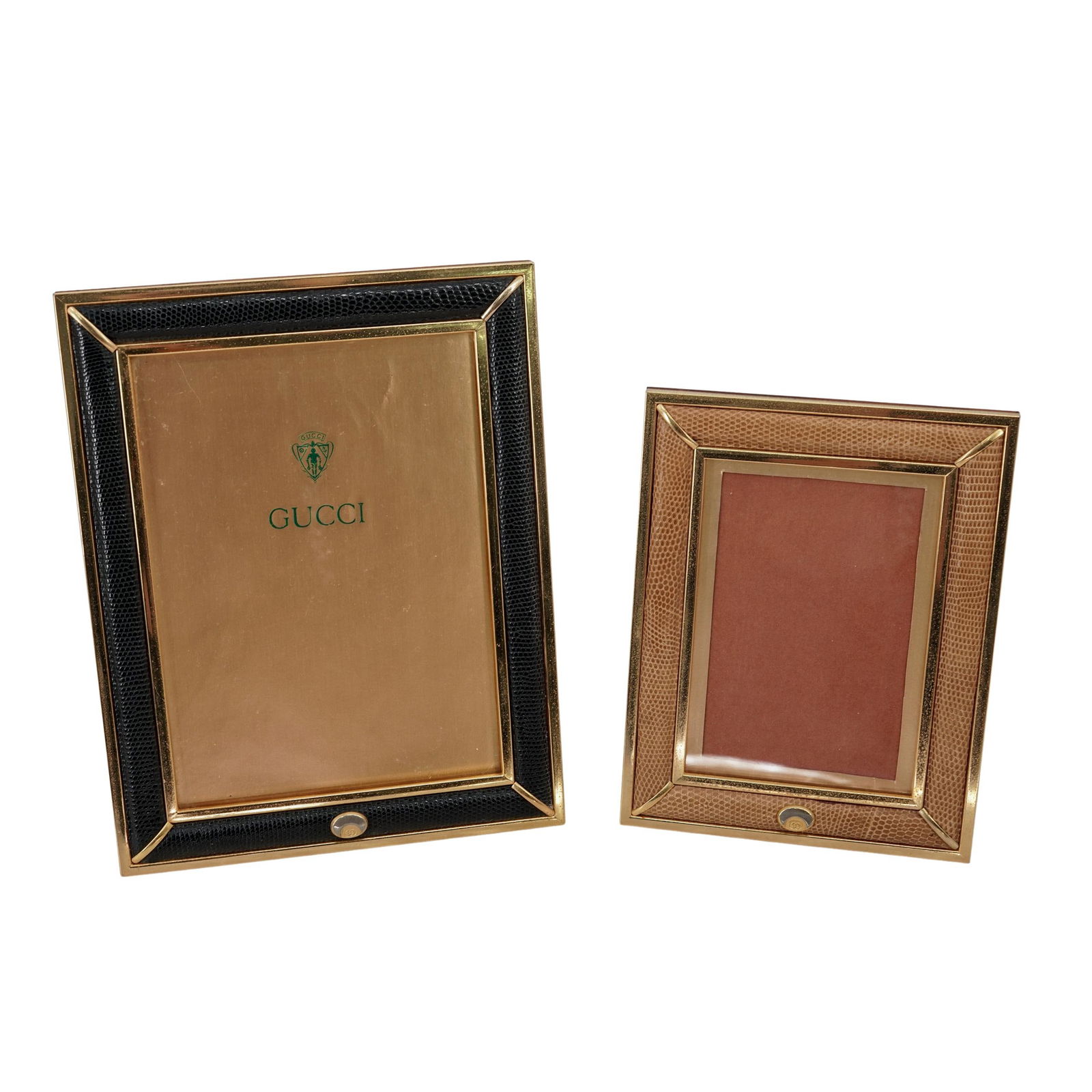 (2 pcs) Vintage Gold Plate & Leather Picture Frames: (2 pcs) Vintage Gold Plate & Leather Picture Frames20th century, ItalianA set of two vintage leather and gold plated metal picture frames. Marked on back with plaque reading "Gucci made in Italy".H 7.
