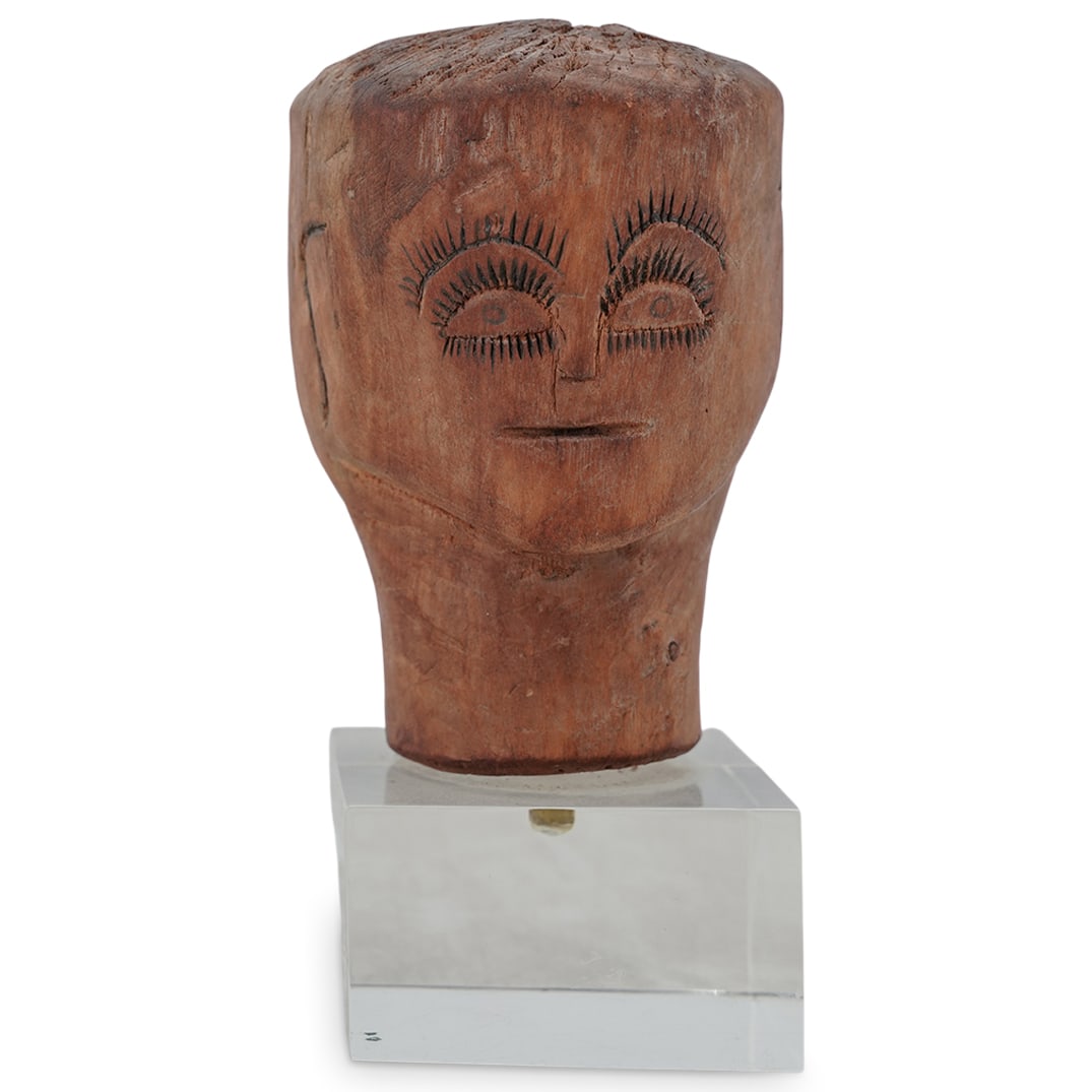 Brazilian Ex-Voto Folk Art Head: Brazilian Ex-Voto Folk Art Head Early 20th c., Brazil Hand-carved wooden Brazilian Ex-Voto folk art head. It is mounted to a clear lucite base. Provenance: Private Palm Beach Estate. H: 6" W: 3.5"