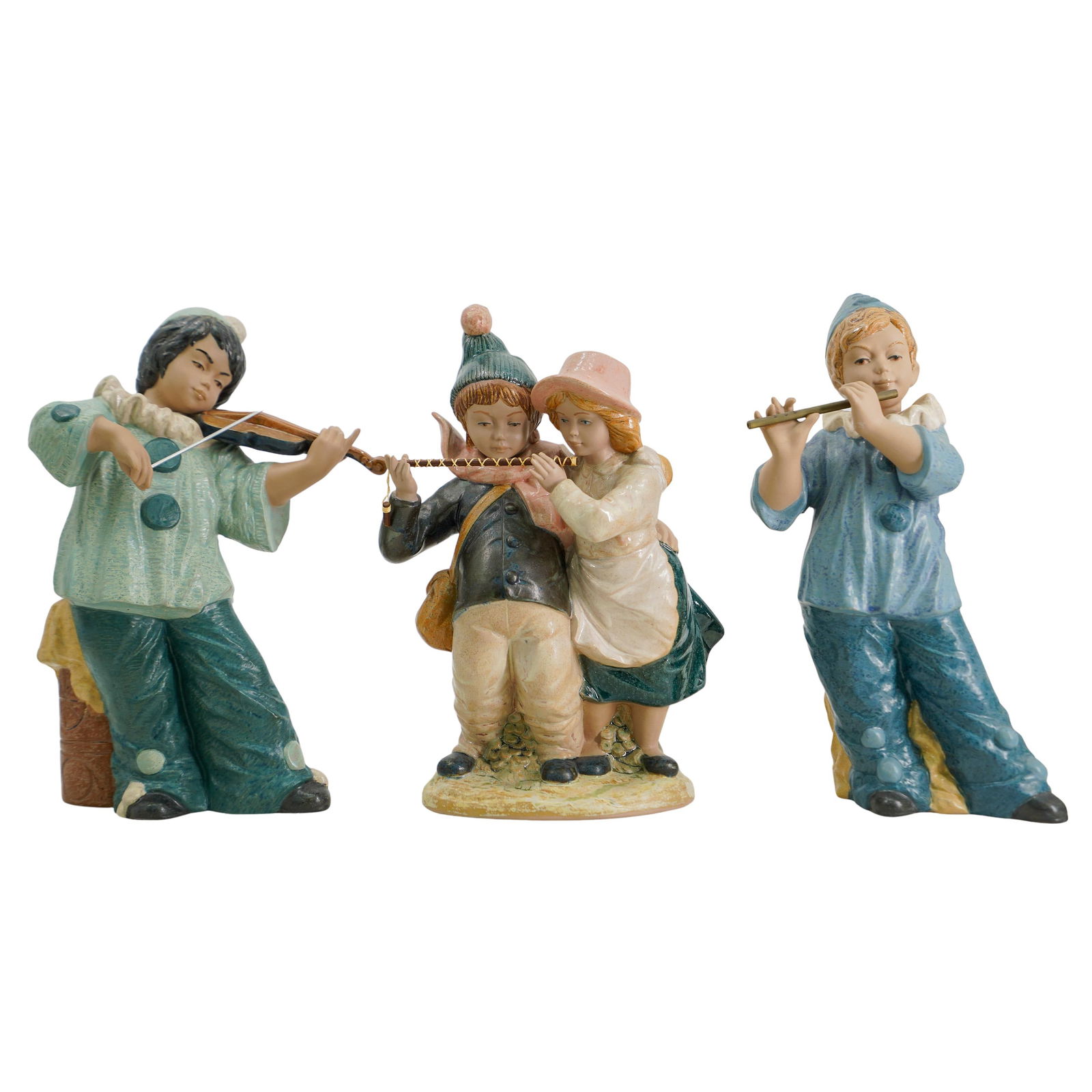 (3 pcs) NADAL Spanish Handcrafted Porcelain Musical Figurines: (3 pcs) NADAL Spanish Handcrafted Porcelain Musical Figurines 20th Cent., Spain Three figures depicting children playing musical instruments. Child Clown with Violin: With NADAL Handcrafted Spanish