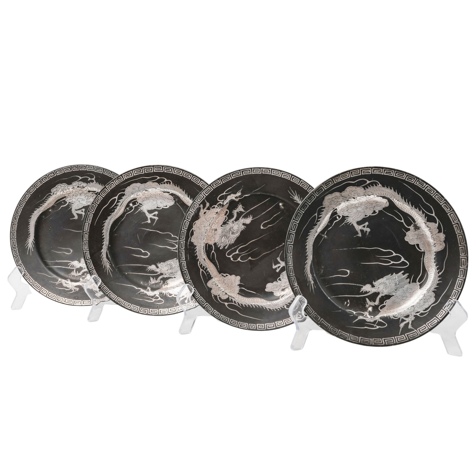 (4 Pc) Imperial Nippon Porcelain Dragonware plates: (4 Pc) Imperial Nippon Porcelain Dragonware plates 19th century, Japanese The plates characterized by the tactile, raised decoration of the dragon motif, in silver on a gray background with a