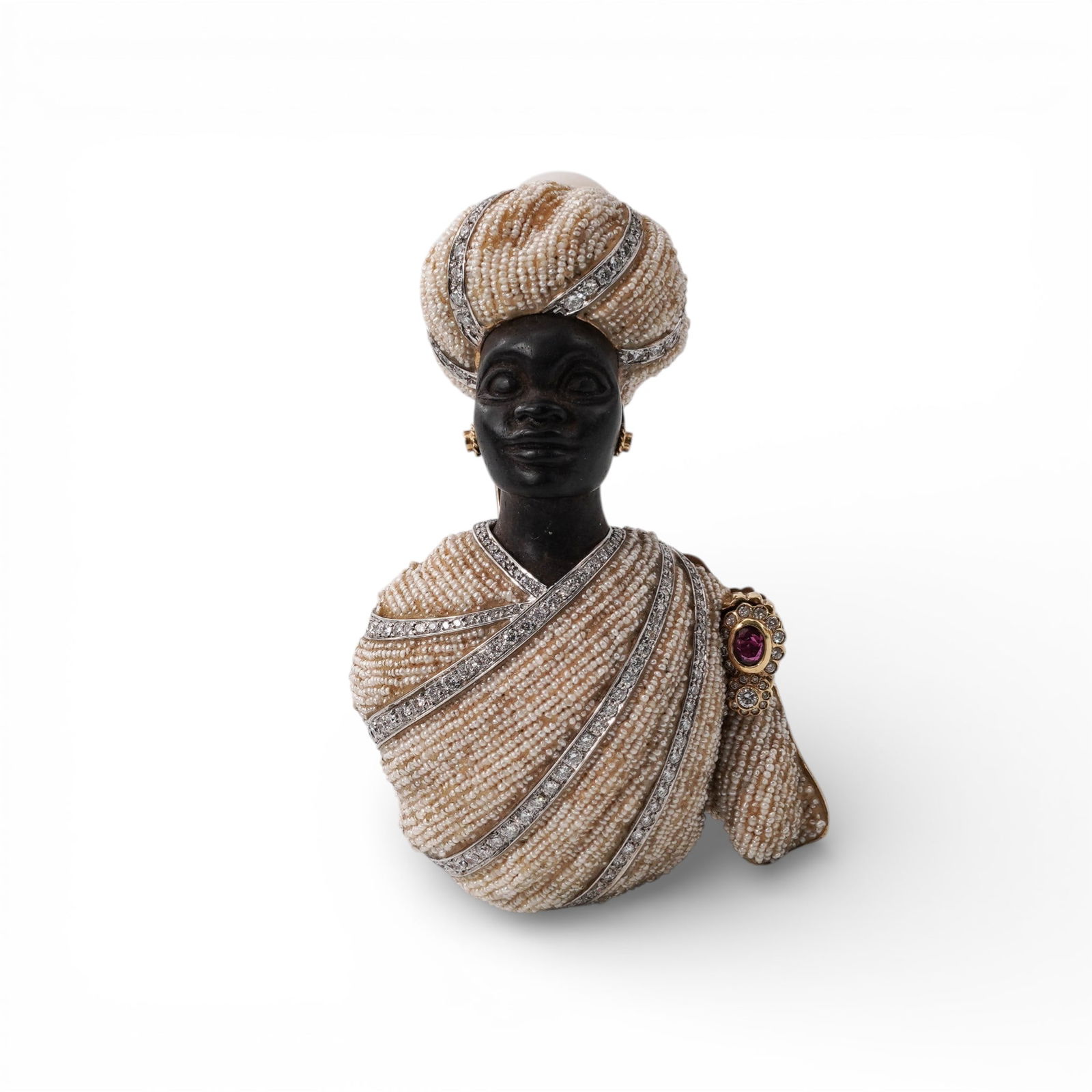 Vintage Blackamoore 18k Diamond & Pearl Brooch: Vintage Blackamoore 18k Diamond & Pearl Brooch1970s, ItalianHighly unusual and large figural Blackamoor brooch depicting a sculpted bust dressed in elaborate attire. The turban and draped garment are