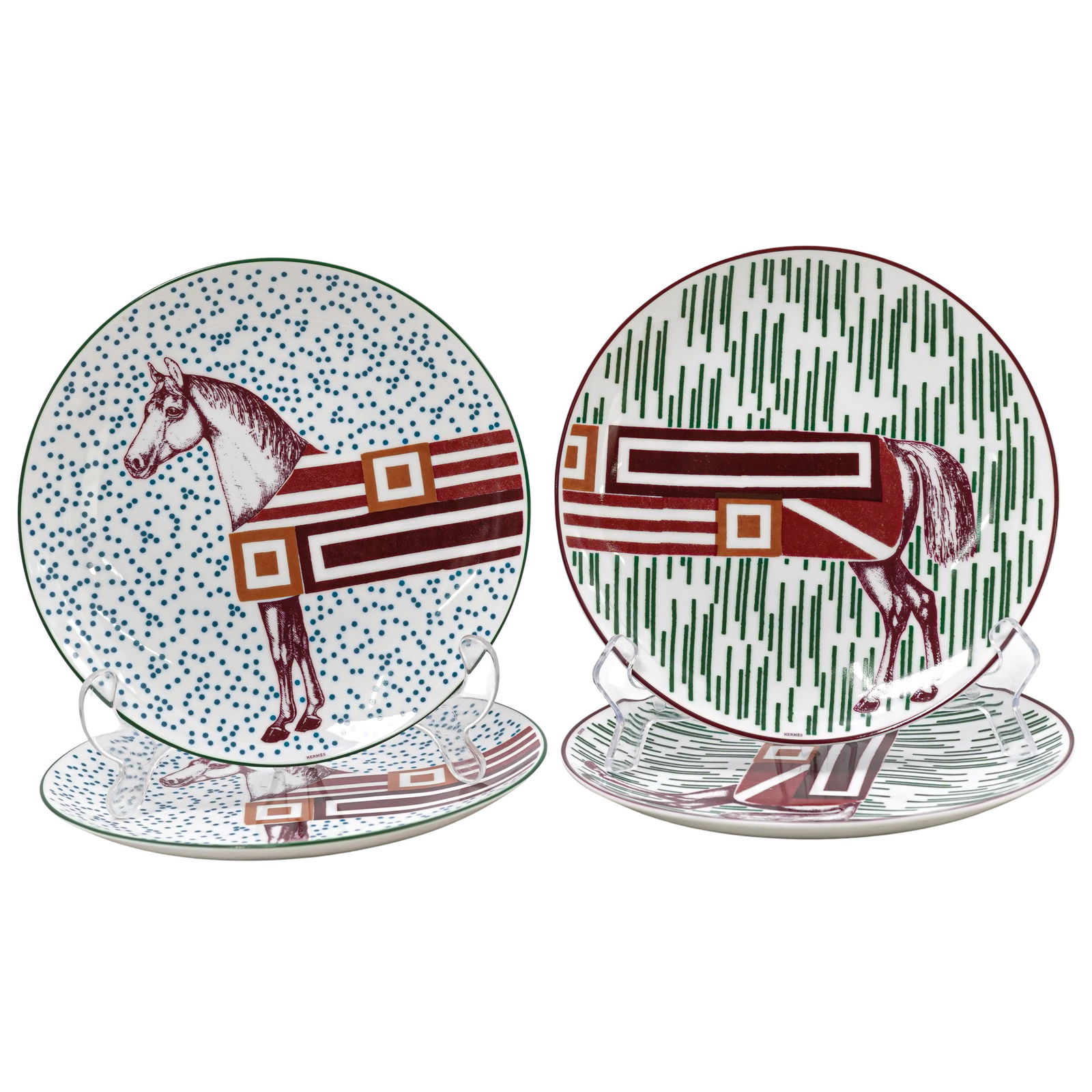 (4 Pc) Gianpaolo Pagni x Hermes "Hippomobile" Porcelain Plates: (4 Pc) Gianpaolo Pagni x Hermes "Hippomobile" Porcelain Plates21st century, FrenchHermes Hippomobile dessert plates featuring a horse design that "wraps around" or stretches across multiple pieces, in