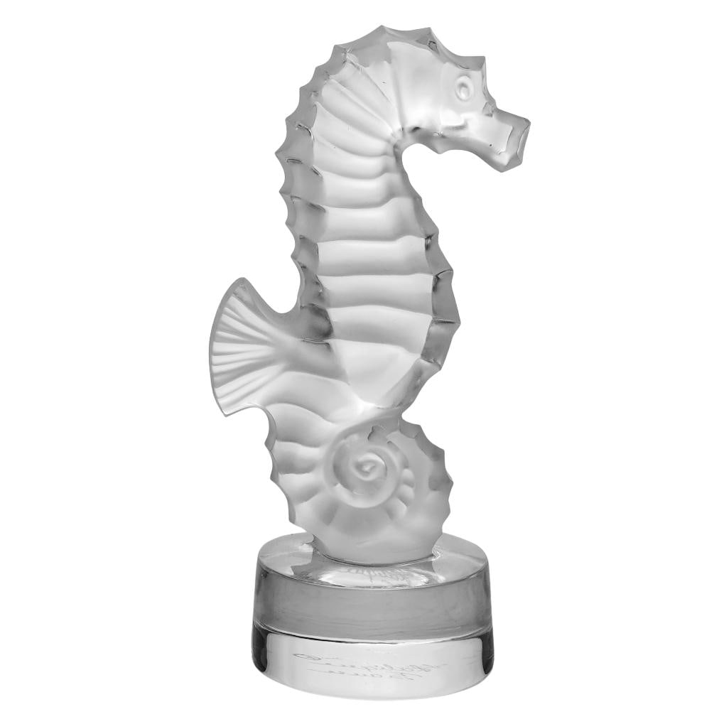 Lalique Crystal Clear & Frosted Seahorse Figurine: Lalique Crystal Clear & Frosted Seahorse Figurine 20th century, French The figurine is crafted from clear and frosted, hand polished crystal and features a seahorse design. Marked "Lalique France" on