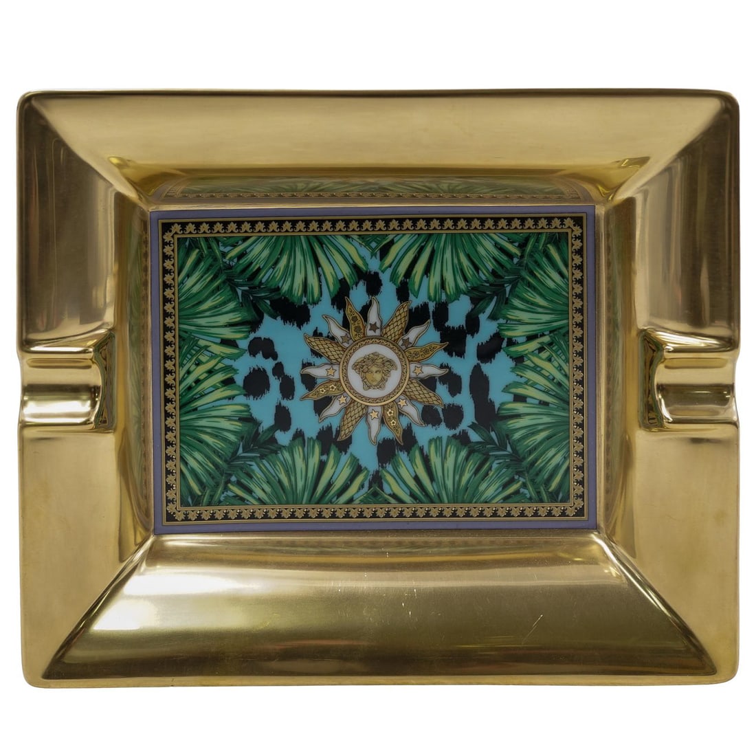 Versace x Rosenthal "Jungle Animalier" Porcelain Ashtray: Versace x Rosenthal "Jungle Animalier" Porcelain Ashtray21st century, GermanThis collection features a vibrant fusion of Versace's iconic Jungle printwith animalier patterns and a central golden Medus