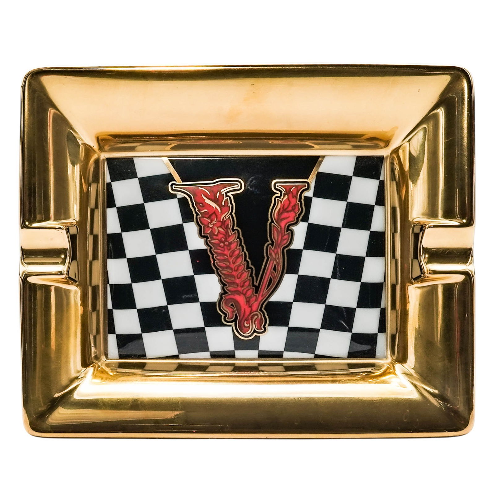 Versace x Rosenthal "Virtus 5" Ashtray: Versace x Rosenthal "Virtus 5" Ashtray21st century, GermanA Versace x Rosenthal porcelain ashtray in the style "Virtus 5", featuring a gold tone border with a checkered center and red foliate "V". Mar