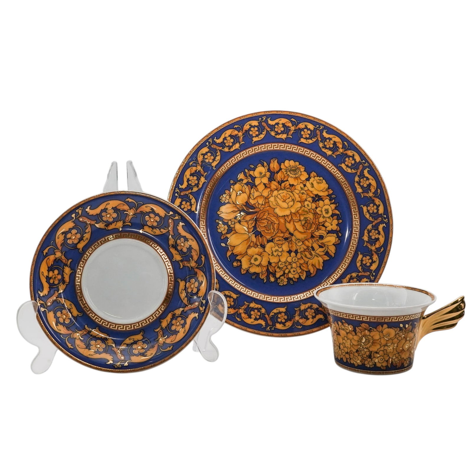Versace x Rosenthal 25th Anniversary Floralia Porcelain Set: Versace x Rosenthal 25th Anniversary Floralia Porcelain Set20th century, GermanyVersace Floralia Blue Porcelain Set Celebrating 25 Years by Rosenthal. The set includes : charger, cup and saucer. Marke