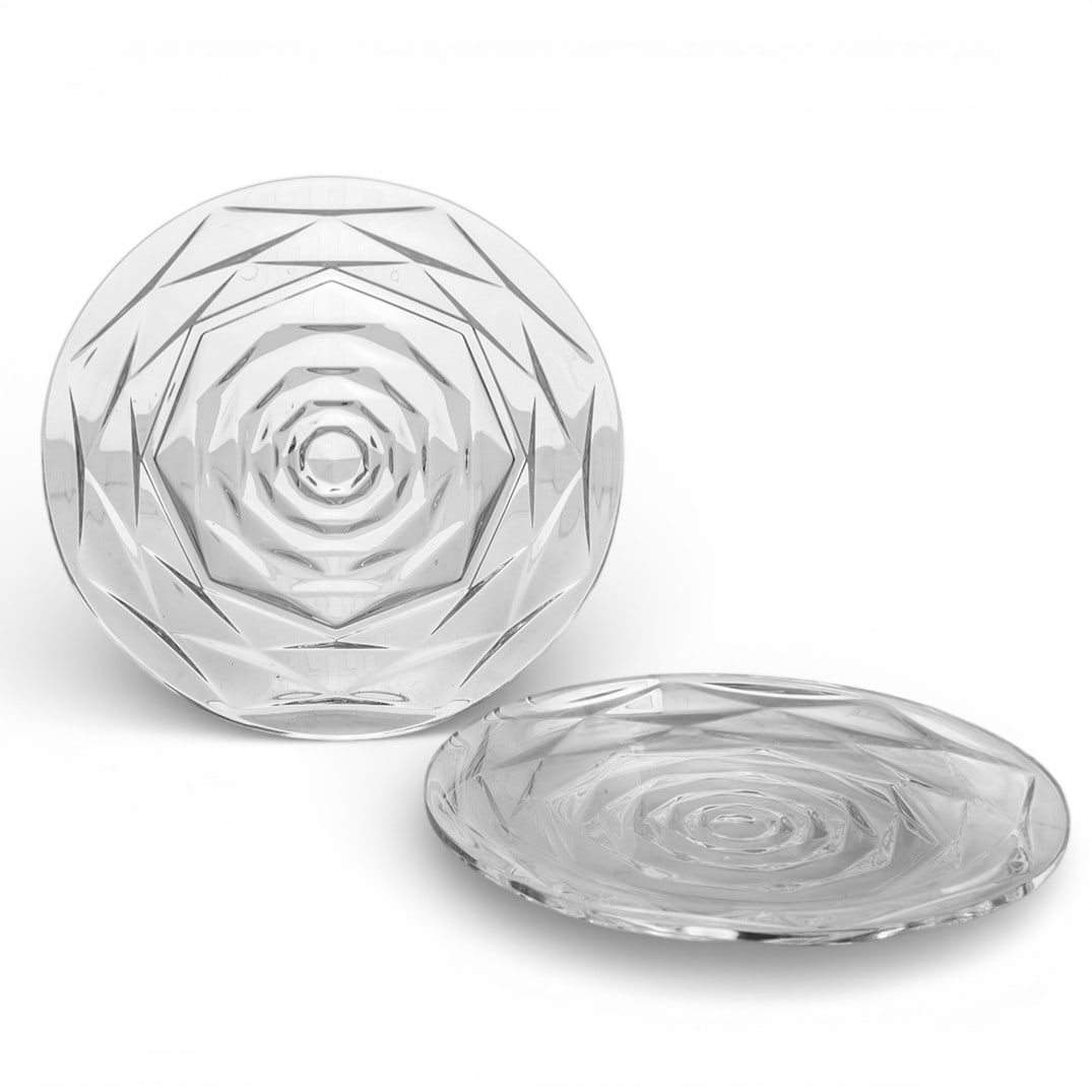 Pair Baccarat Crystal Swing Plates: Pair Baccarat Crystal Swing Plates21st century, FrenchBaccarat Crystal Swing Plates from Swing collection introduced circa 2020, designed by Paul Ared. Plates feature a faceted cut pattern that create