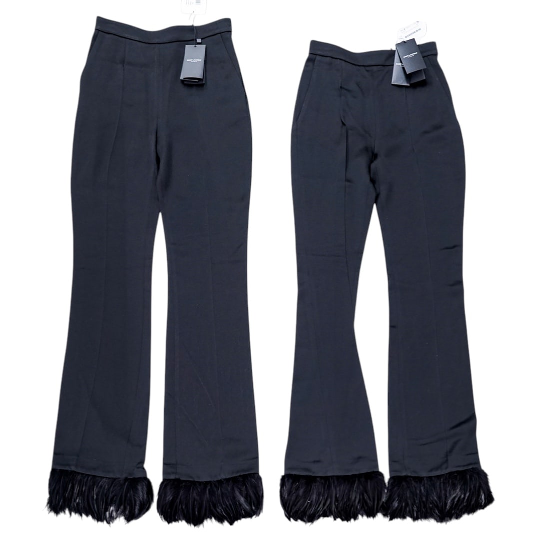 (2 Pc) Saint Laurent Black Feather Cuffed Pants: (2 Pc) Saint Laurent Black Feather Cuffed Pants21st century, FrenchTwo pairs of Saint Laurent black silk-viscose blend pants with cock black gallus domesticus (red junglefowl) cock feather trimmed cuf