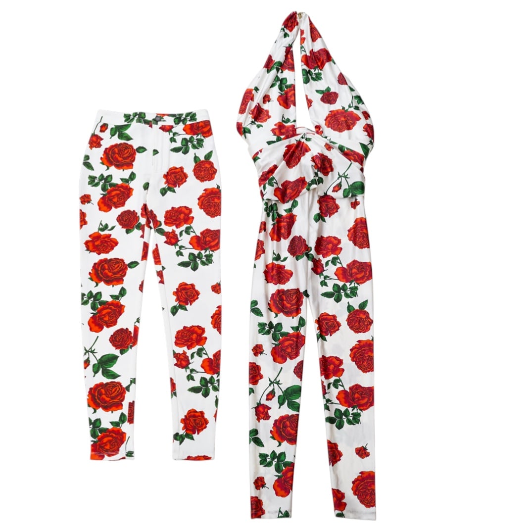 Saint Laurent "Craie Rouge" Rose Trousers & Jumpsuit: Saint Laurent "Craie Rouge" Rose Trousers & Jumpsuit21st century, FrenchA set of two Saint Laurent "Craie Rouge" garments with floral rose patterns.(1) Skinny jeans. Size F34 (US size 2). Zippered fly