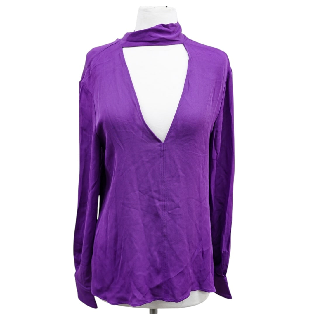 Valentino Purple Silk Blouse: Valentino Purple Silk Blouse 21st century, Italian A Valentino royal purple silk blouse. Features a v-neck, bishop style cuffed sleeves, and a scarf ribbon collar that can be tied in multiple ways.