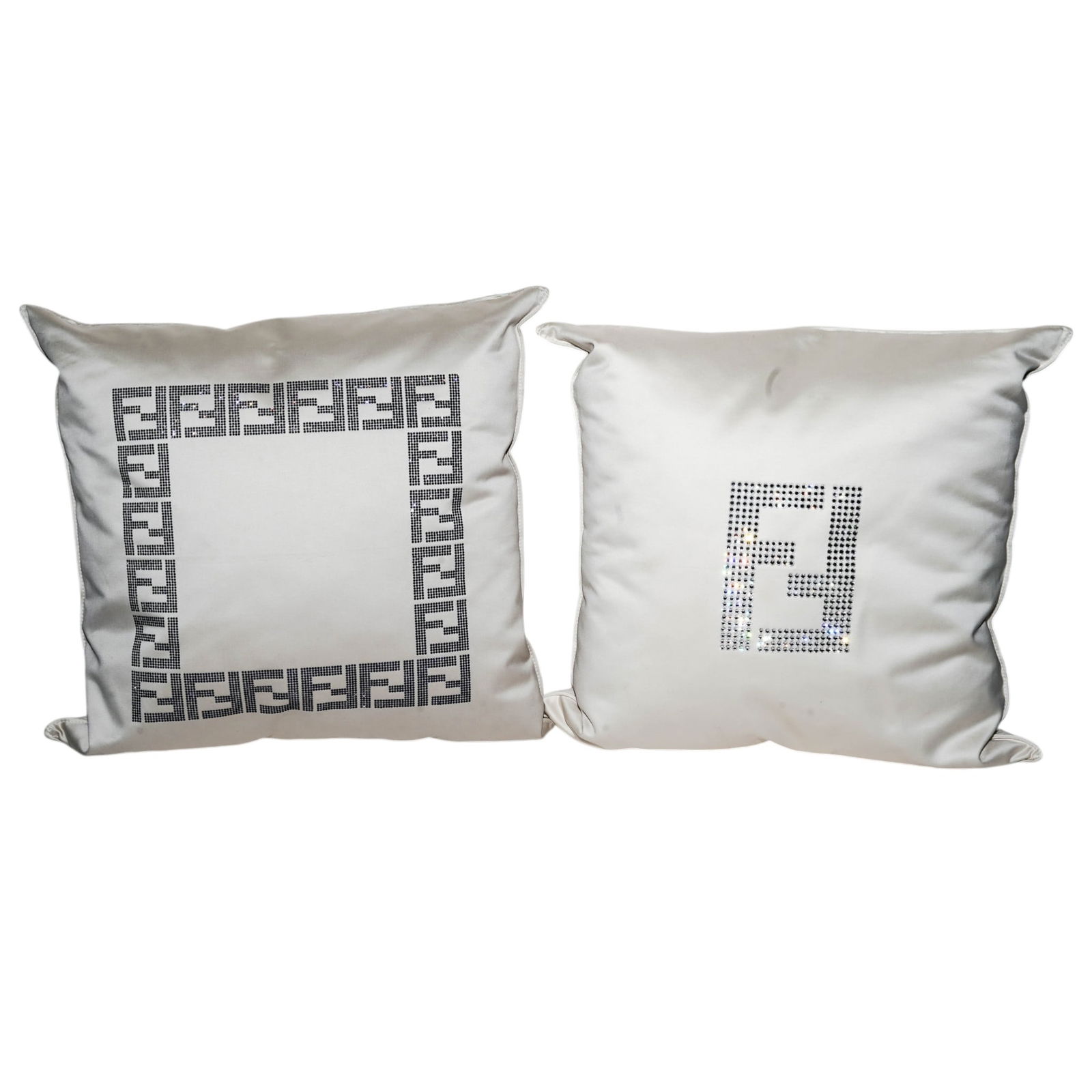 (2 Pc) Fendi Rhinestone Pillows: (2 Pc) Fendi Rhinestone Pillows 21st century, Italian A set of two Fendi rhinestone pillows. Each pillow has a silver tone metal "Fendi" plaque at corners. (1) Fendi rhinestone double logo pillow.