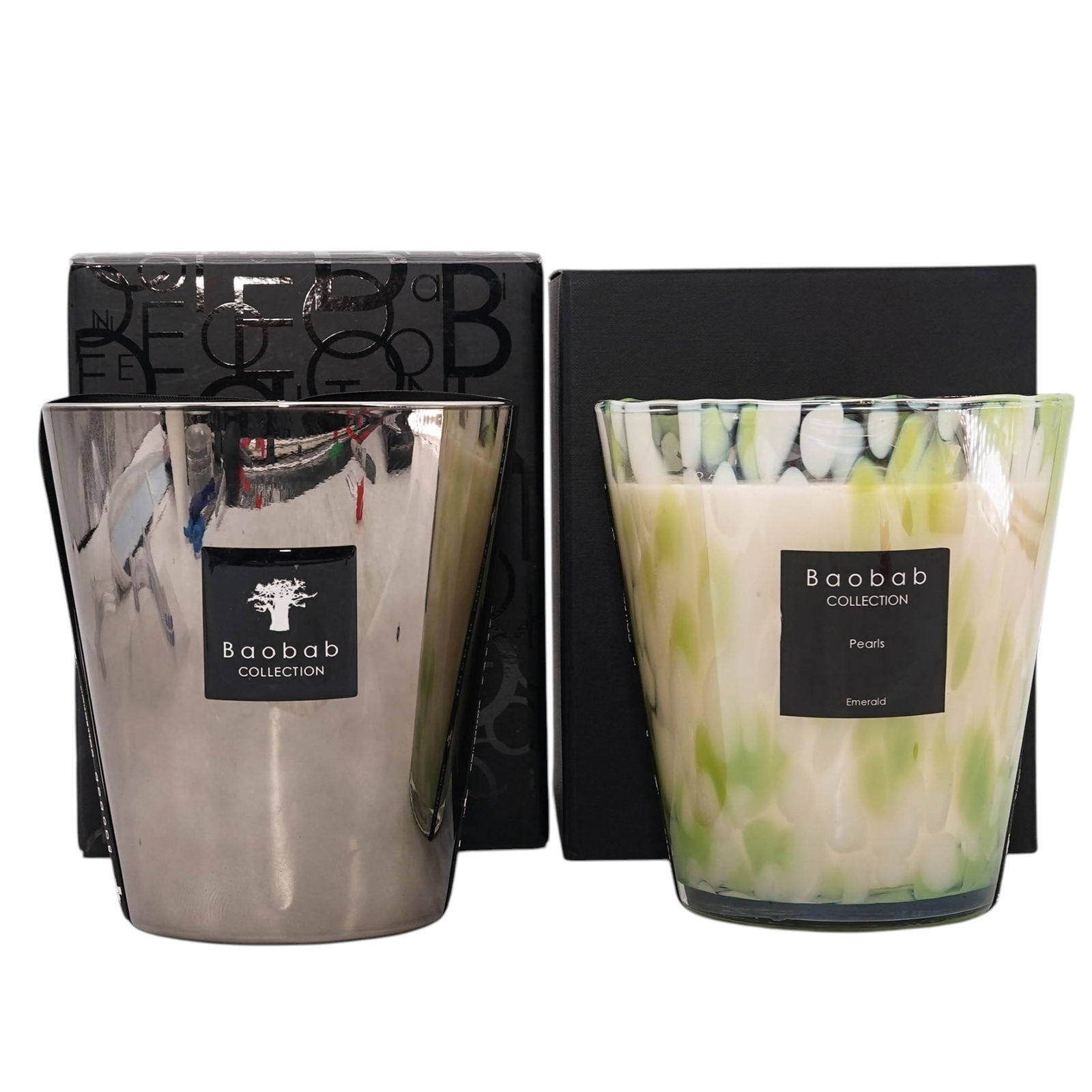 (2 pcs) Baobab Collection Max 10 Candles Grouping: (2 pcs) Baobab Collection Max 10 Candles Grouping 21st century, Tanzanian Two Baobab Collection Max 10 (500g) candles in the scents "Les Exclusives Platinum" and "Pearls Emerald". Candles H 3.75" x