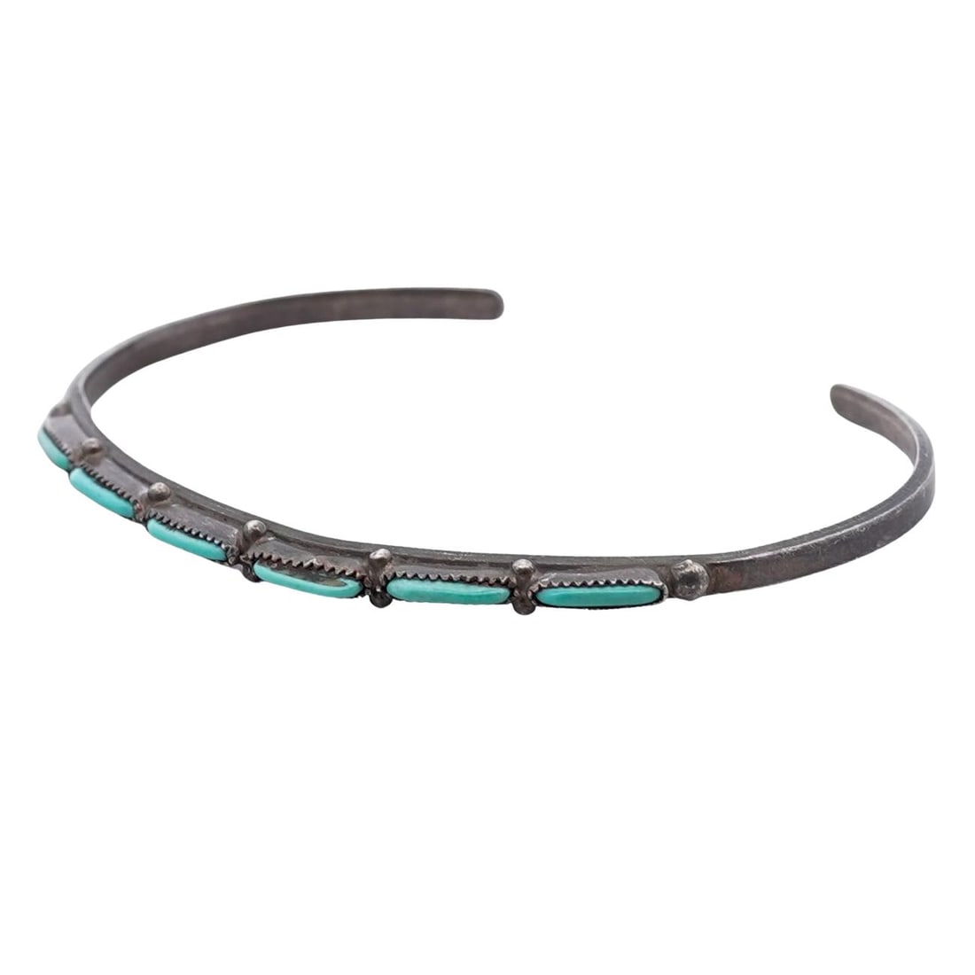Vintage Navajo Sterling Silver & Turquoise Bracelet: Vintage Navajo Sterling Silver & Turquoise Bracelet 1970s-1980s, American Vintage Navajo sterling silver cuff bracelet with linear turquoise segments set in slender bezels along the front half of the