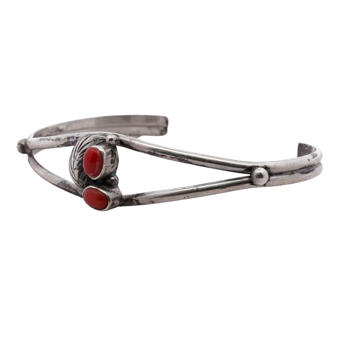 Vintage Navajo Sterling Silver & Coral Bracelet Signed: Vintage Navajo Sterling Silver & Coral Bracelet Signed 1970s-1980s, American Vintage Navajo sterling silver cuff bracelet set with two oval red coral cabochons, each measuring approximately 6 × 4