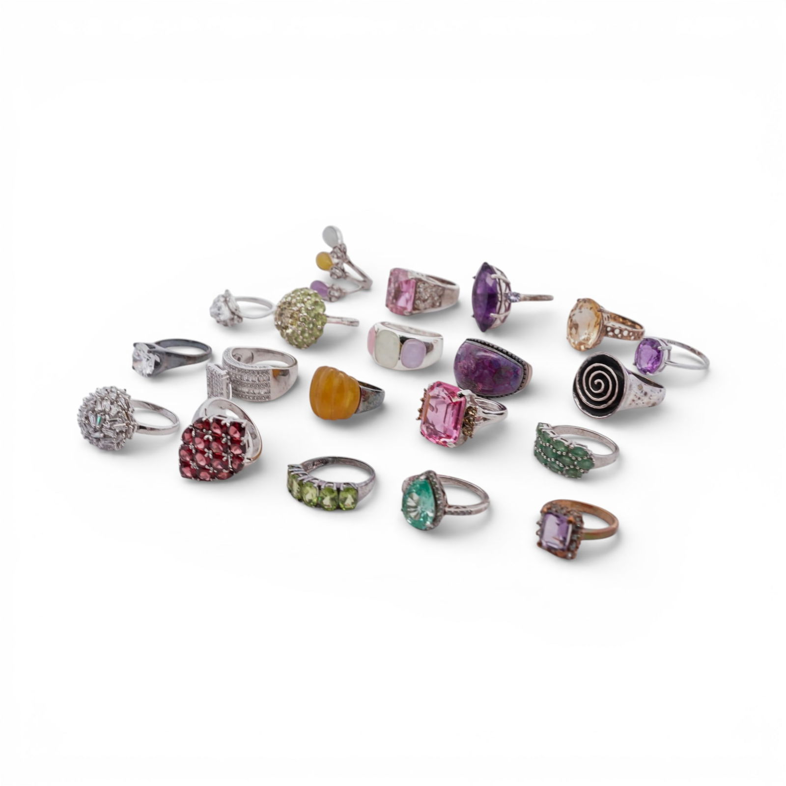 (20 Pcs) Sterling Silver & Synthetic Stone Ring Collection: (20 Pcs) Sterling Silver & Synthetic Stone Ring Collection Late 20th Century A mixed lot of twenty sterling silver rings set with assorted synthetic stones in colorless and various hues. The
