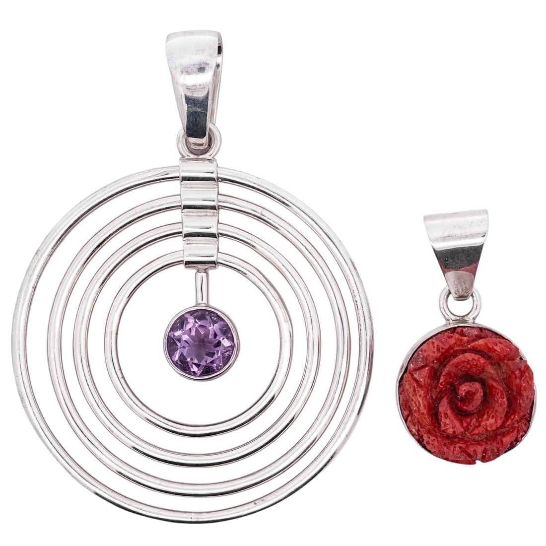 (2 Pcs) Charles Albert Fine Sterling Silver Pendant Set: (2 Pcs) Charles Albert Fine Sterling Silver Pendant Set Late 20th Century A group of two sterling silver pendants by Charles Albert. The set includes: (1) large concentric-ring pendant suspending a