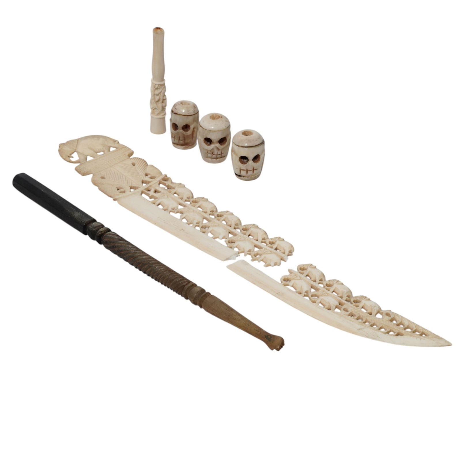 (6 pcs) Antique Asian Carved Bone and Horn Accessories: (6 pcs) Antique Asian Carved Bone and Horn AccessoriesLate 19th-early 20th century, South AsianA set of six South Asian carved bone and horn accessories.(3) Tibetan "Kapala" skull shaped beads, made i