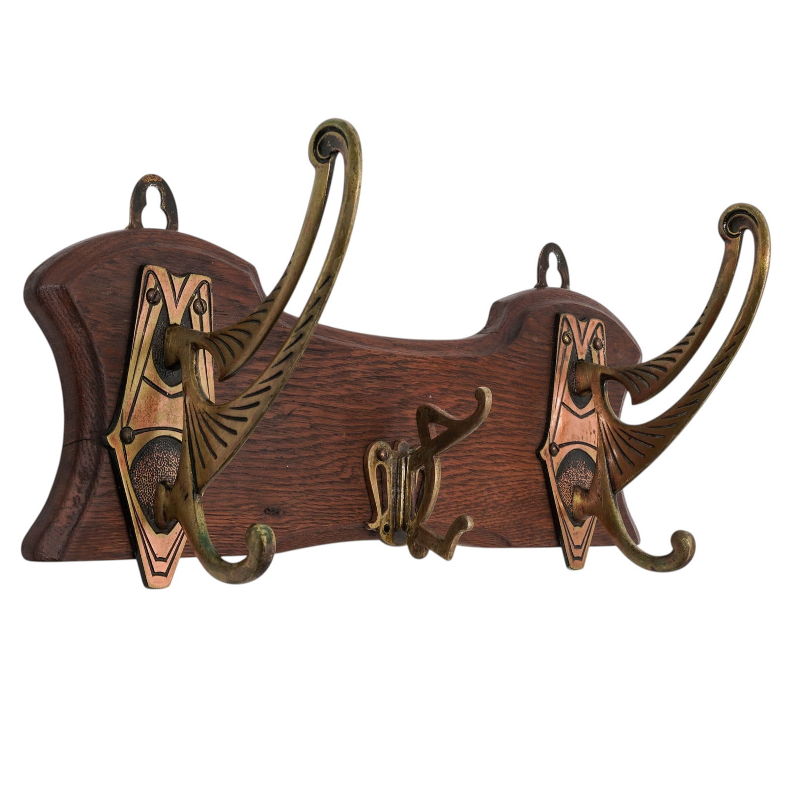 Art Nouveau Brass & Oak Coat Hat Rack: Art Nouveau Brass & Oak Coat Hat Rack20th century, EnglishThe coat rack features ornate, stylized brass hooks mounted on a sculpted solid oak backplate. It has a mark on the back featuring the company