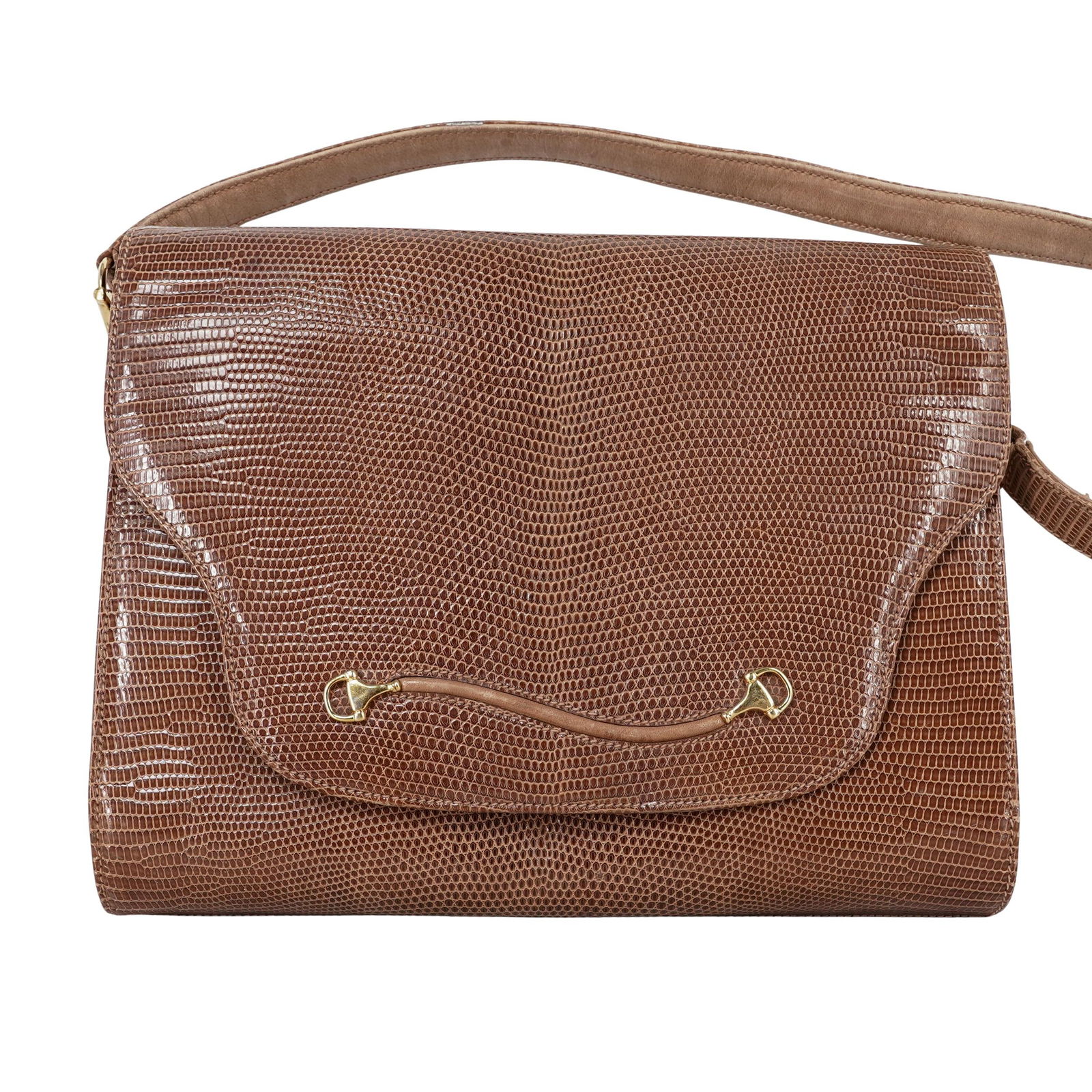 Vintage Gucci Lizard Skin Shoulder Bag: Vintage Gucci Lizard Skin Shoulder Bag 1960s-early 70s, Italian The bag is crafted from genuine lizard skin, a hallmark of Gucci's high-end exotic collections. The distinctive curved gold-tone metal