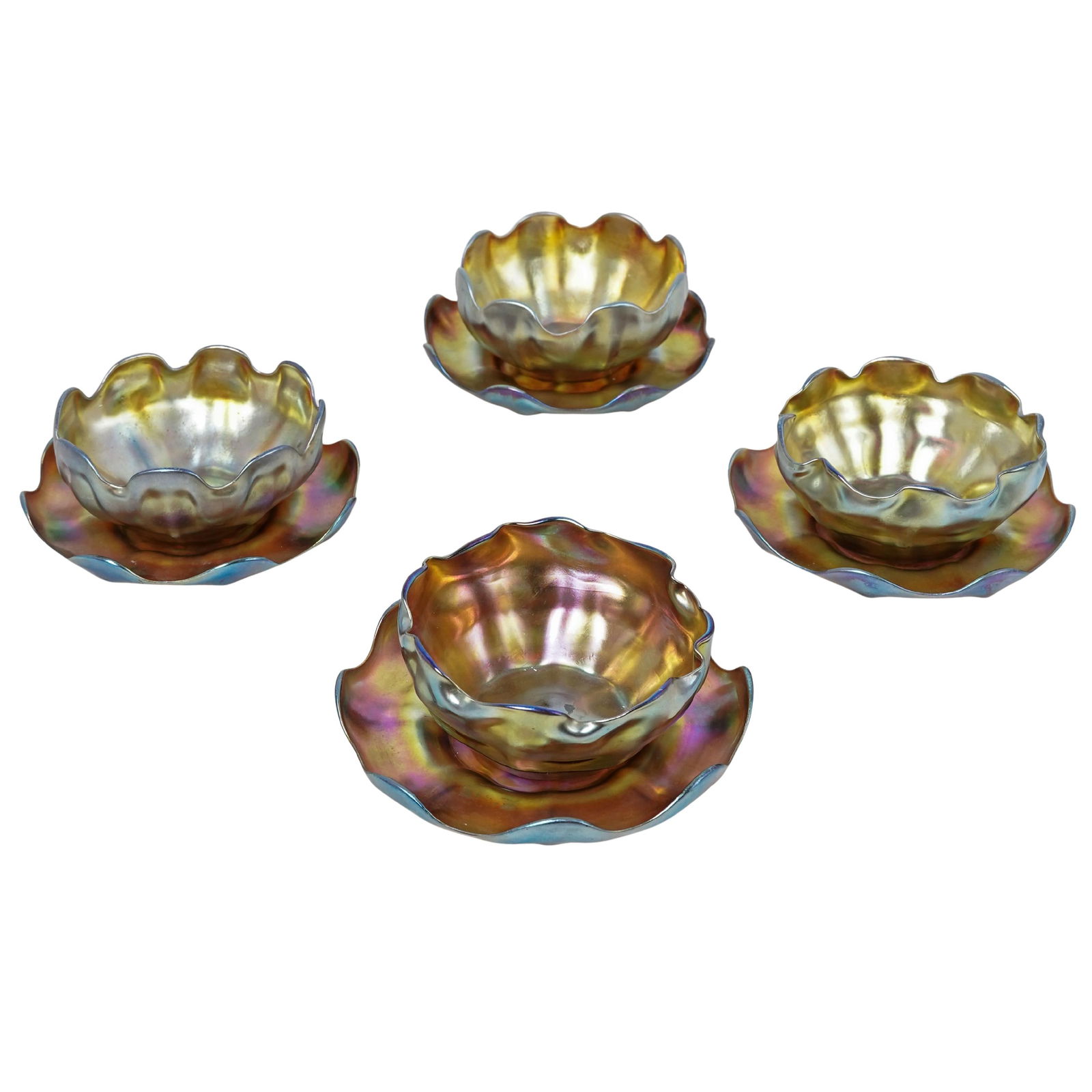 (8 Pc) Tiffany Favrile Glass Finger Bowls & Underplates: (8 Pc) Tiffany Favrile Glass Finger Bowls & UnderplatesLate 19th-early 20th century, AmericanAntique Louis Comfort Tiffany Favrile art glass set of(4) gold finger bowls(4) underplates featuring ruffle