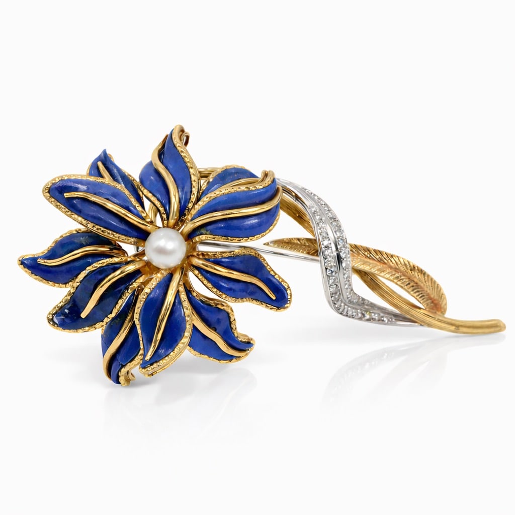 Vintage 18k Gold Lapis Lazuli Pearl & Diamond Floral Brooch: Vintage 18k Gold Lapis Lazuli Pearl & Diamond Floral BroochLate 20th CenturySculptural floral brooch executed in solid 18k yellow and white gold, designed as a stylized flower with curved lapis lazuli