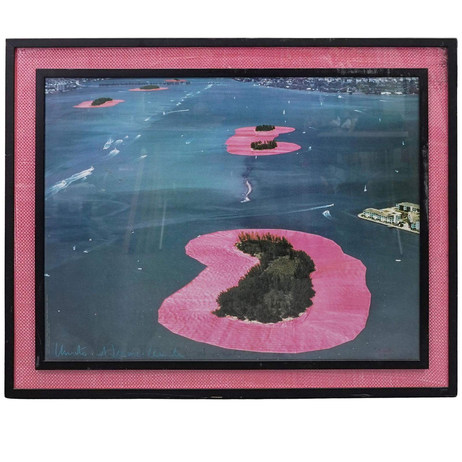 Signed Christo & Jeanne-Claude "Surrounding Islands" Photograph w/ Tarp Remnants: Signed Christo & Jeanne-Claude "Surrounding Islands" Photograph w/ Tarp Remnantscirca 1980s, AmericanA signed photograph by Christo and Jeanne-Claude from their "Surrounded Islands" project in which p