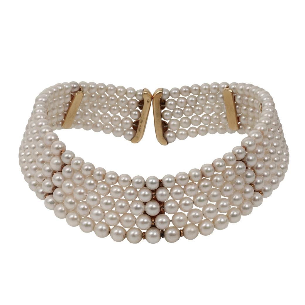 Vintage French 18k Gold & Pearl Choker: Vintage French 18k Gold & Pearl ChokerLate 20th Century, FranceVintage French multi-strand cultured pearl choker necklace composed of uniform round white pearls arranged in a wide collar form. The nec