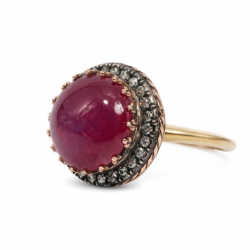 Imperial Faberge Era 14k Gold Silver Ruby & Diamond Ring: Imperial Faberge Era 14k Gold Silver Ruby & Diamond Ring Late 19th–early 20th century, Russia Vintage Russian Fabergé-era ring centered by a round cabochon ruby weighing approximately 10.0 carats,