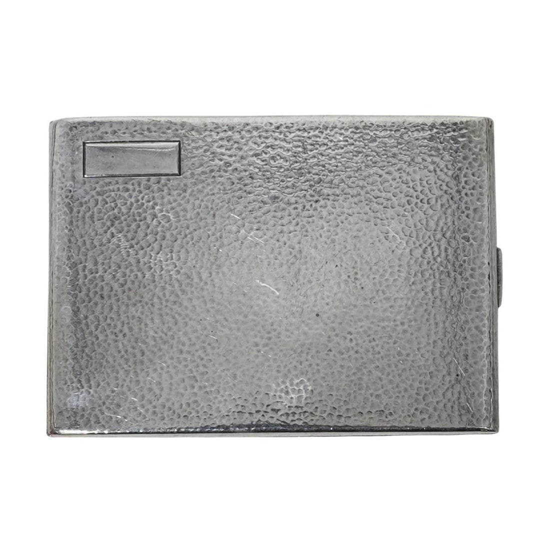 Vintage Hammered Sterling Silver Cigarette Case: Vintage Hammered Sterling Silver Cigarette Case 20th century, Continental Hammered silver cigarette case with rectangular form, textured surface and vermeil interior. Total weight: 114 g. W: 4" x D: