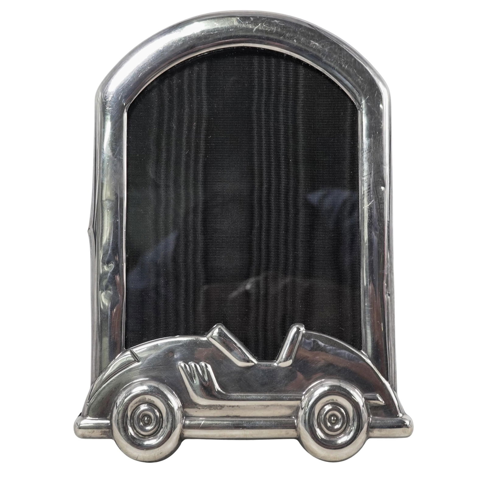 Tiffany & Co. Sterling Silver Car Picture Frame: Tiffany & Co. Sterling Silver Car Picture Frame 20th century, Spanish Tiffany & Co. sterling silver frame featuring a vintage-style race car at the base. Stamped "Tiffany & Co. 925 Spain" at the